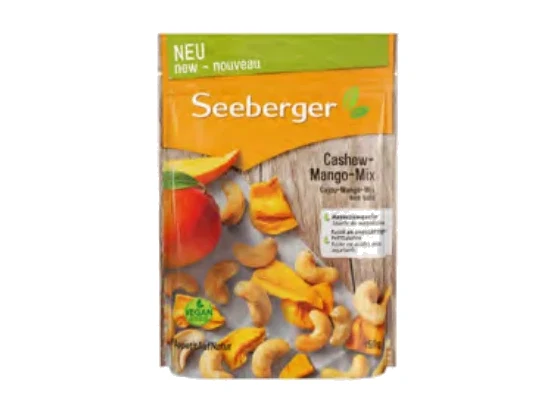 Seeberger Cashew-Mango-Mix – Snacktüte mit gerösteten Cashewkernen und fruchtigen Mangostücken für Energie unterwegs.