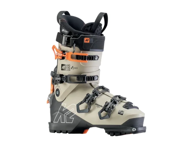 K2 Mindbender 130 Skischuh in Grün/Schwarz, Fokus auf Freeride und Tourenfunktionen. Produktbild.