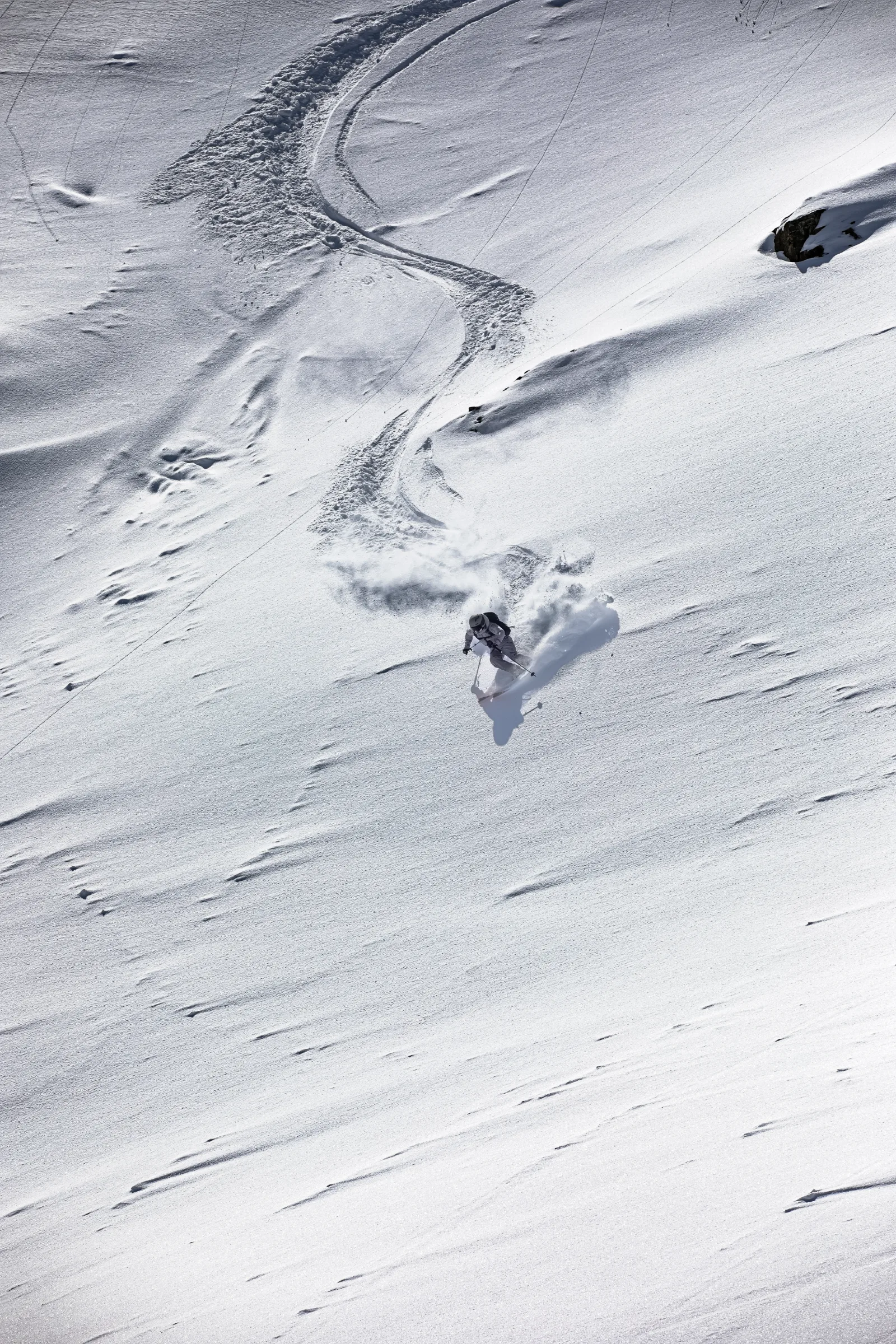 Andrea Limbacher skiing powder in Lenzerheide